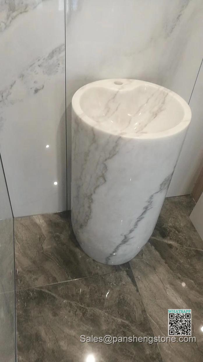 Marble pedestal basin